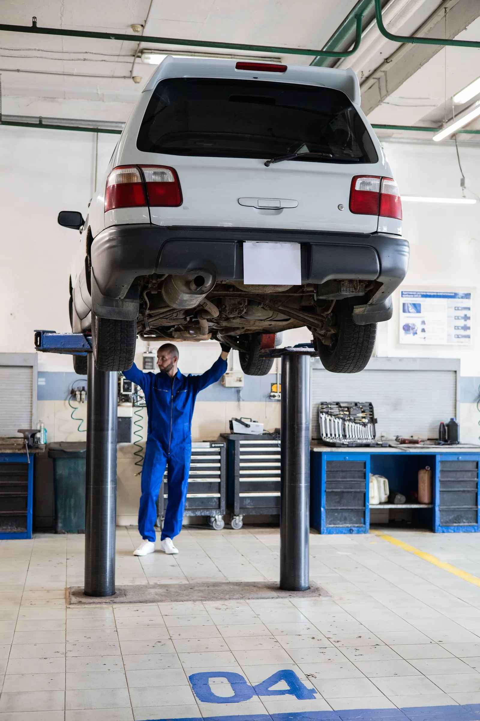 A car raised on the MOT ramp